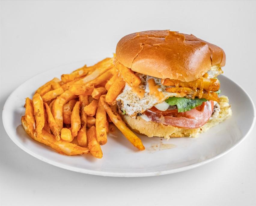 Loaded burger and fries.